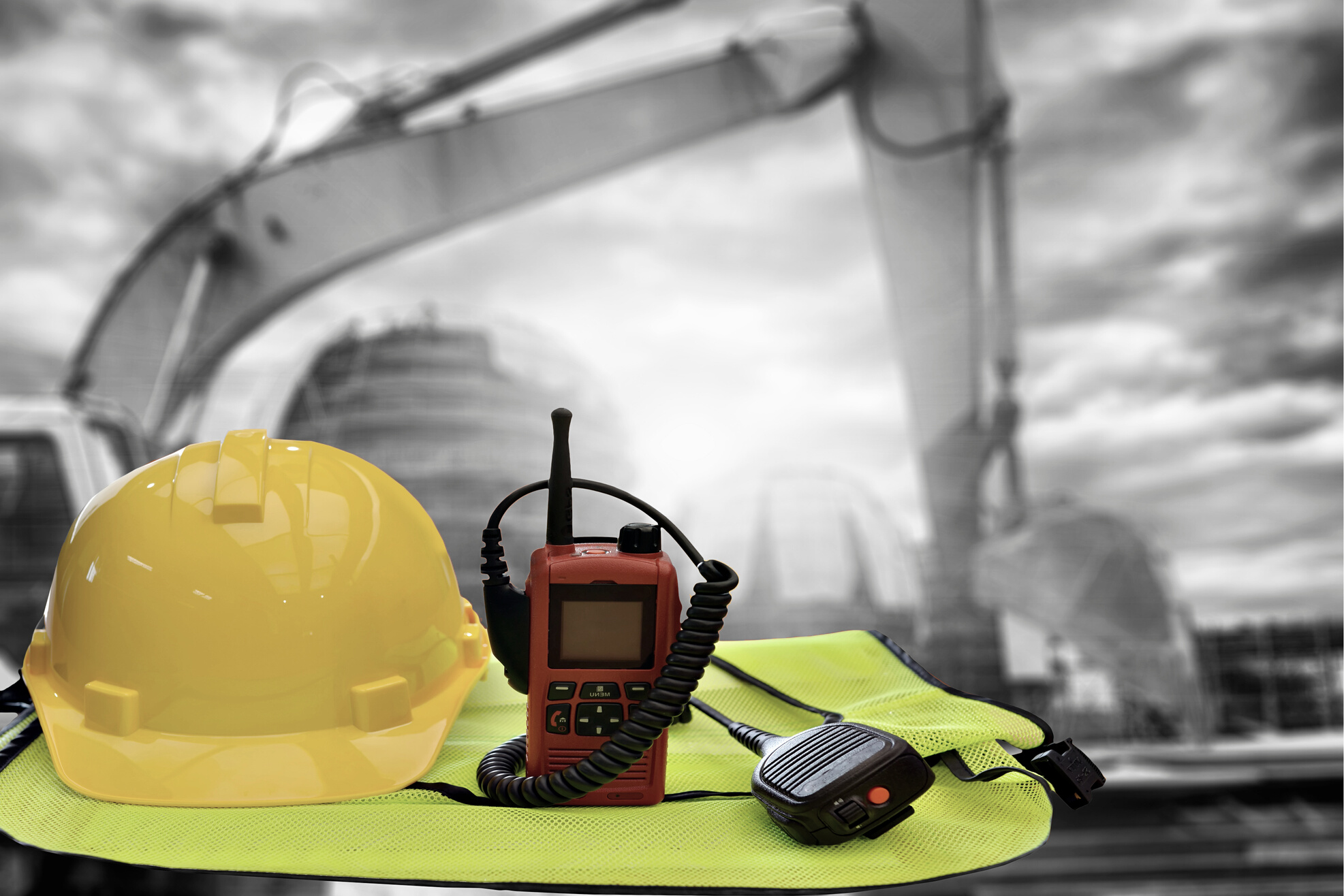 work outdoor wear safety equipment  at  construction site . occupational health and safety concept .